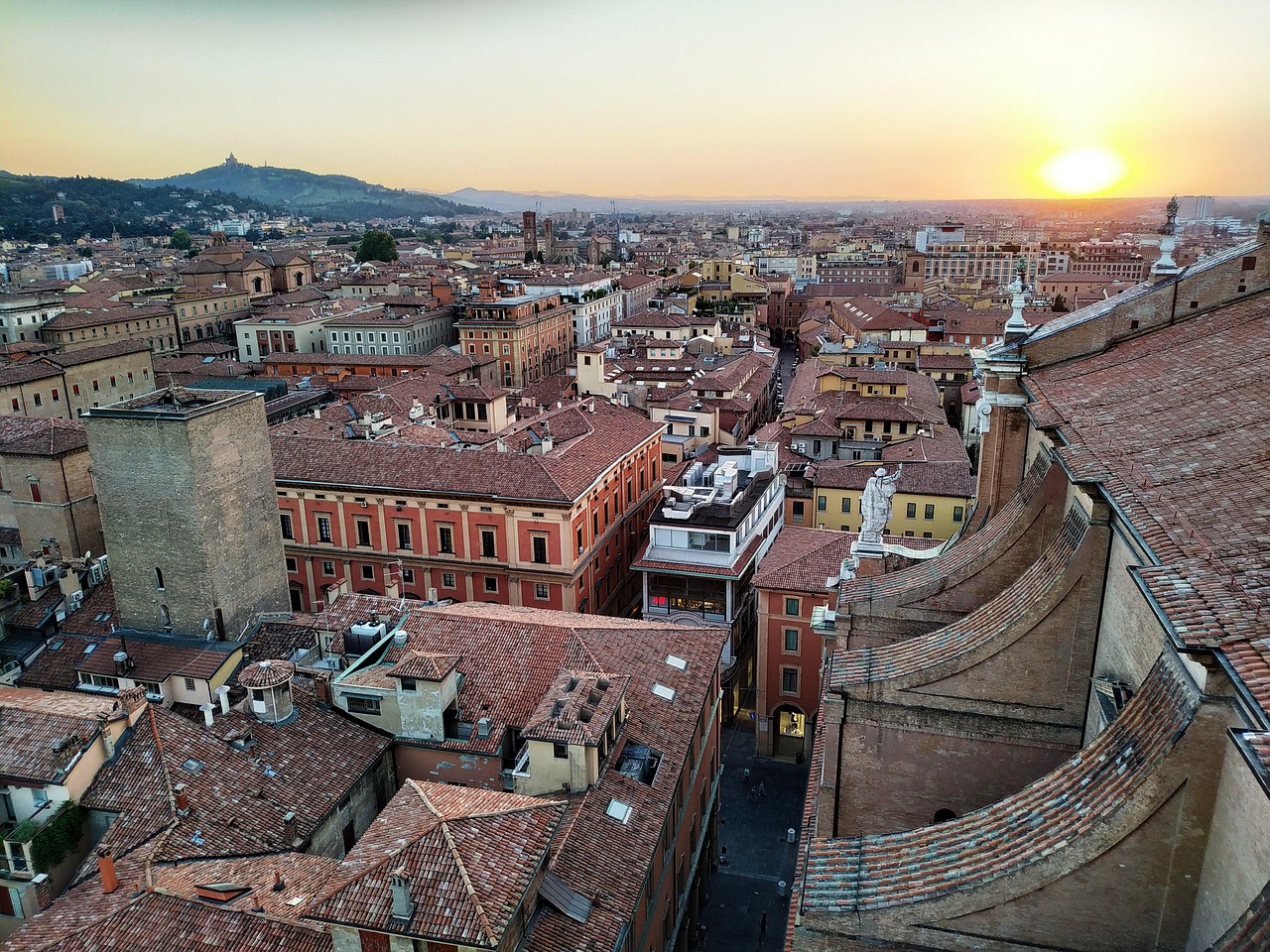 Panoramic view of Bologna with medieval towers and terracotta rooftops, Italy