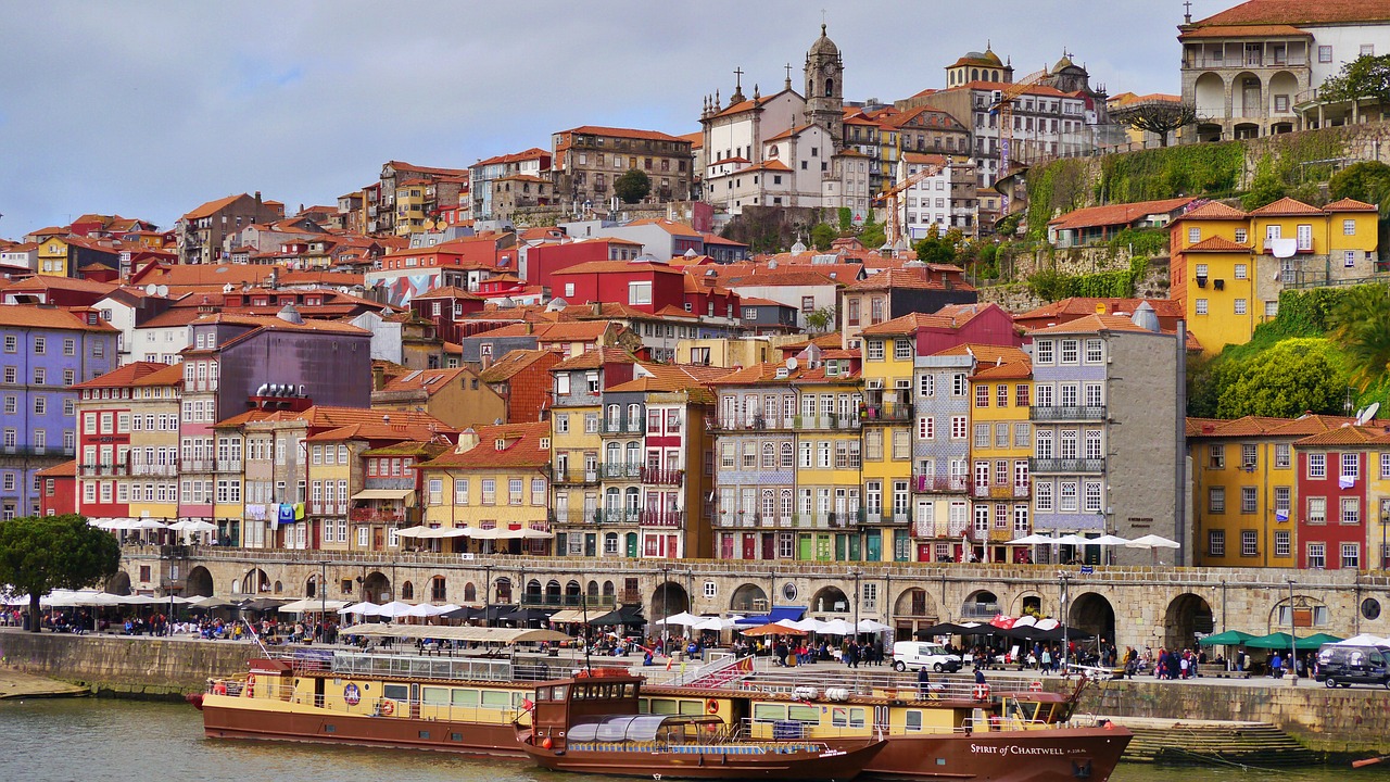 Colorful buildings and traditional boats in Porto, Portugal